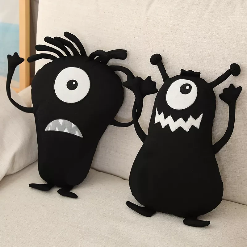 Poduszką w kształcie monstra
