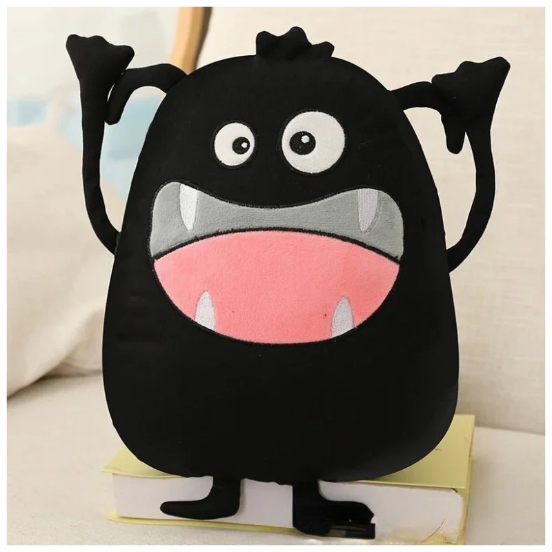 Poduszką w kształcie monstra