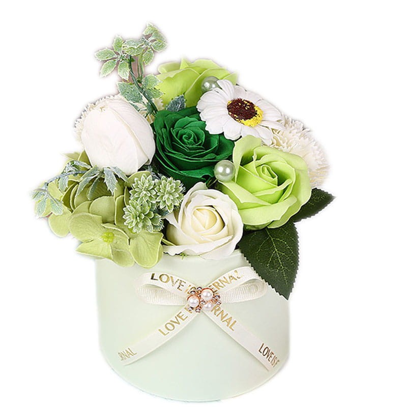 Elegancki flowerbox z  kwiatami mydlanymi w ozdobnym pudełku z kokardką – idealny prezent dla niej.
