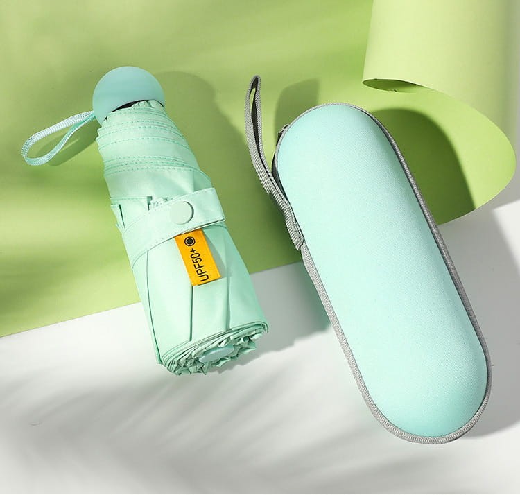 Parasolka mini w kolorze miętowym z etui kapsułkowym. UV50+, wodoodporna, składana – stylowy dodatek na każdą pogodę.