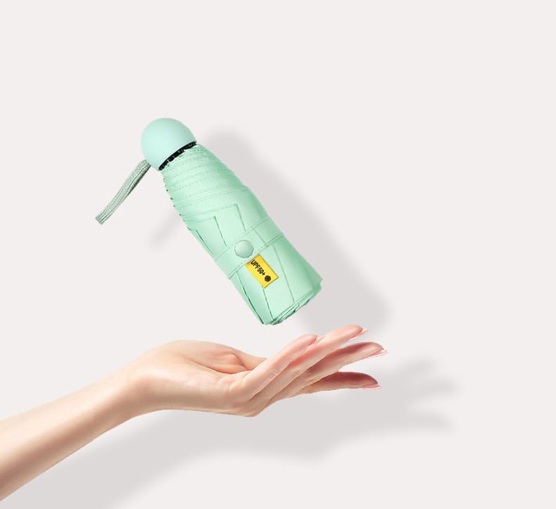 Parasolka mini w kolorze miętowym z etui kapsułkowym. UV50+, wodoodporna, składana – stylowy dodatek na każdą pogodę.