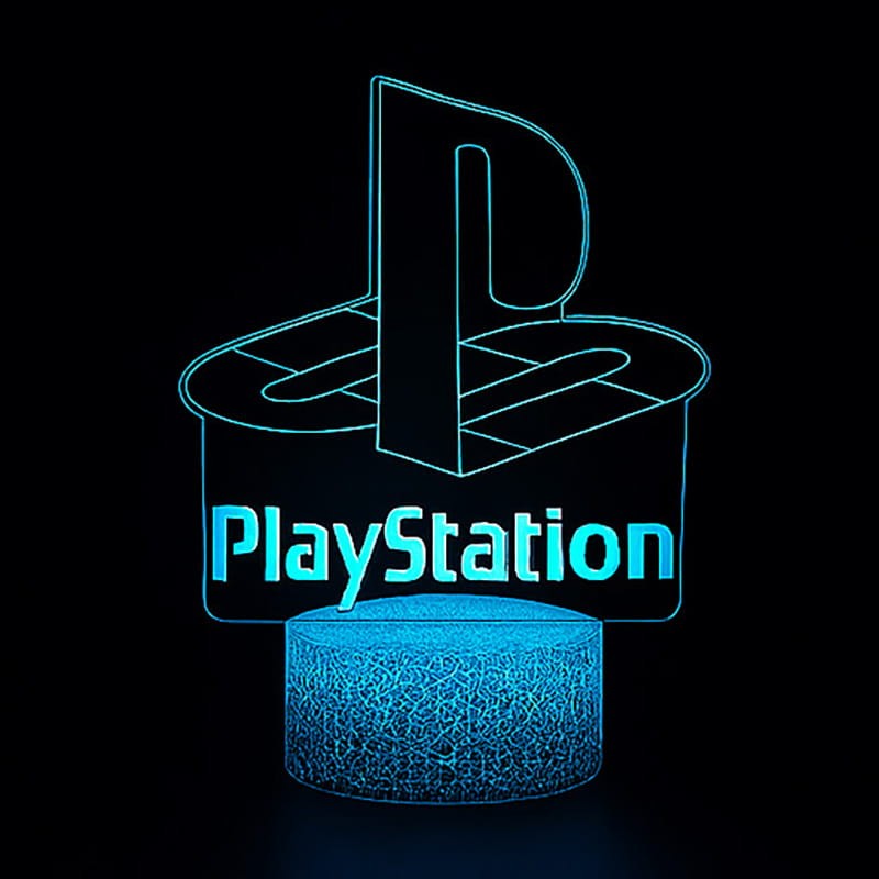 Lampka nocna 3D LED USB – PlayStation. Efektowny gadżet dla gracza z 16 kolorami światła, pilotem i zasilaniem USB. Idealny prezent dla fana gier i konsol.