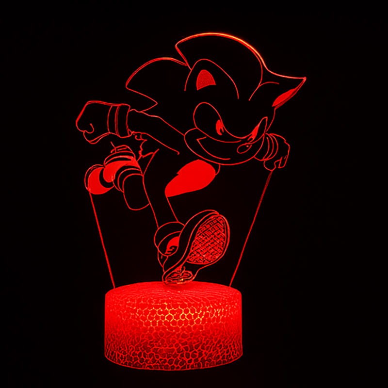 Lampka nocna 3D USB Sonic – nowoczesna lampka z postacią z bajki, biała podstawa i kolorowe światło.