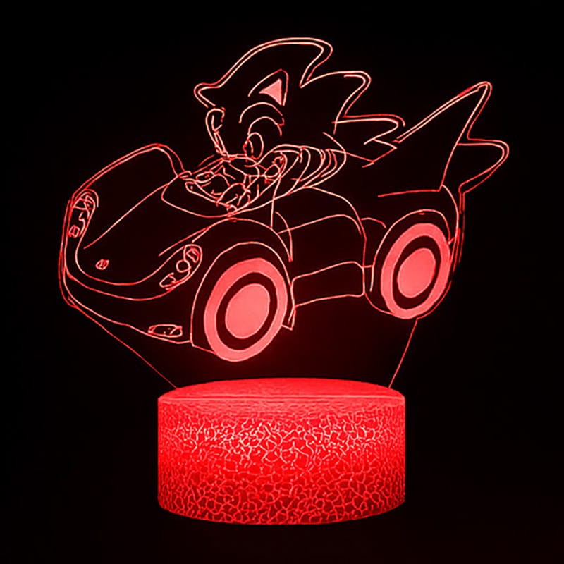 Lampka 3D LED USB z pilotem – Mały Sonic w samochodzie z bajki. Kolorowa, bezpieczna lampka nocna dla dzieci z efektem 3D. 16 kolorów światła, pilot i zasilanie USB – idealny prezent dla fana Sonica.